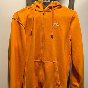 Orange Nike zip up